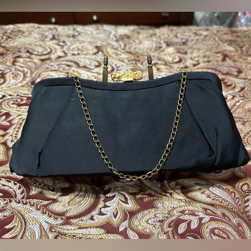 Elegant Black Clutch with Gold accent and Gold strap